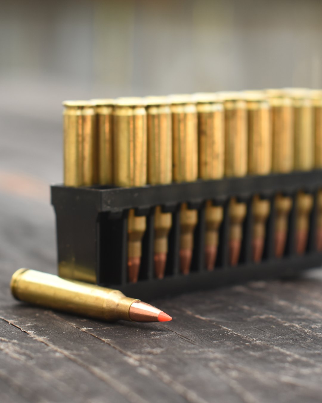 Boxes of ammunition stored inside a fire-rated home safe alongside firearms