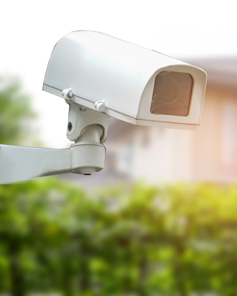 Security camera mounted outside a residential home, perimeter deterrent, one layer of a complete protection plan
