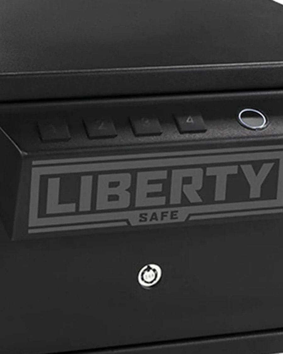 Close-up of a Vaultek quick-access safe front panel showing the numbered keypad and biometric fingerprint reader